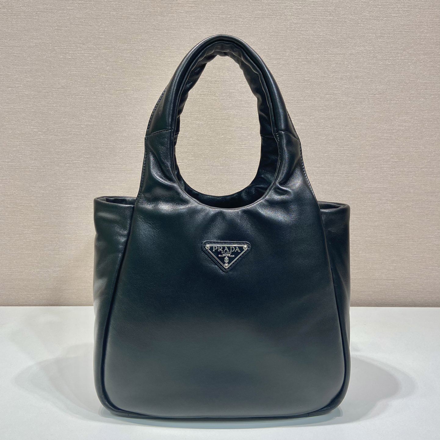 Pra*a top handle bags